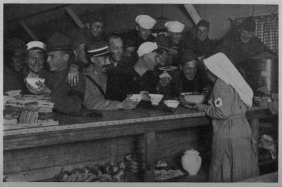 SUPPER HOUR AT BORDEAUX No matter what hour; always the gobs and buddies—other armies as well as our own—ready with 100 per cent appetites