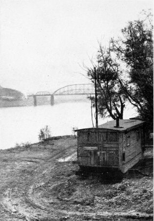 The waterside at Martin’s Ferry. Near this spot stood the little brick house in which Mr. Howells was born.